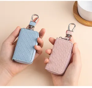Astuccio per chiavi auto in pelle intrecciata con gancio in metallo e zip per uomini e donne.
