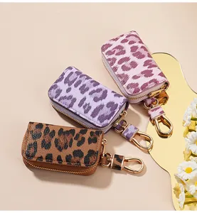 Etui de cle de voiture en cuir imprime leopard avec fermeture eclair et crochet metal