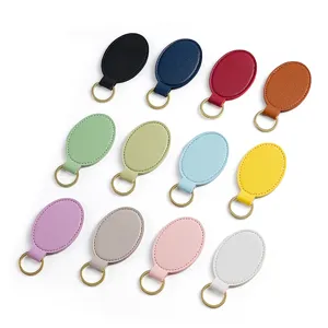 Llavero de cuero PU multicolor moda simple anillo de llave redondo para hombres y mujeres 12 pz