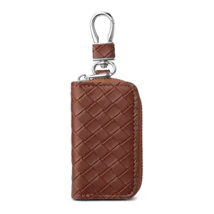Astuccio per chiavi auto in pelle intrecciata marrone con zip e gancio in metallo portafoglio.