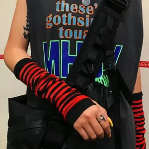 Close-up of red and black striped knit arm warmers in Y2K gothic punk style