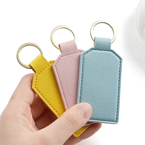 Fashion minimalist PU leather keychain with square design, durable metal ring for daily use.