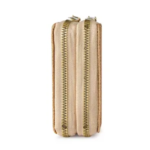 Porte-cartes portefeuille à double fermeture éclair et tissu pailleté stylé, compact et pratique.