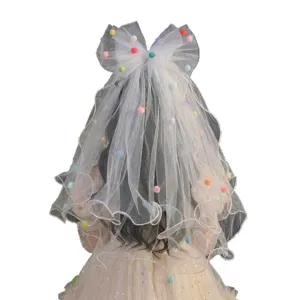 White princess veil for girls with colorful pom-poms and bow hair clip for birthday parties