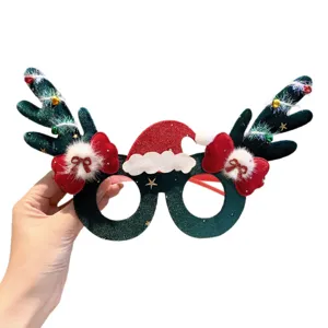 Gafas navideñas festivas con astas de reno para fiestas de disfraces y decoraciones navideñas.