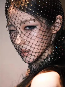 Exquisite rhinestone mesh face mask for music festivals, showing sparkling details.