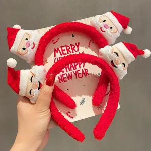 Festive set of two plush red headbands featuring cute Santa Claus figurines for Christmas