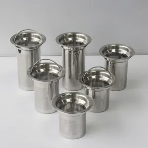 Stainless steel mesh tea strainer detail, precision micro-perforated infuser tool.