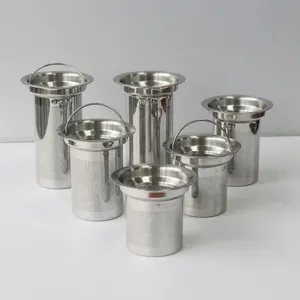 Stainless steel tea strainer detail showing fine mesh and handle design for loose leaf tea brewing.