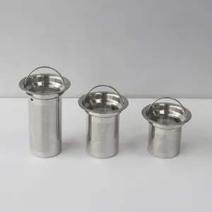 Stainless steel tea strainer detail showing fine mesh and convenient metal handle design.