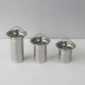 Detailed view of three stainless steel tea strainers with handles, 304 material design.