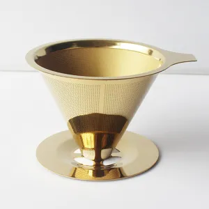Detail view of the gold stainless steel coffee filter cone featuring a dual-layer mesh design.