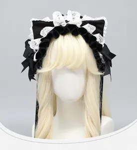 Sweet lolita black and white lace cat ear headdress KC detail showing exquisite lace trim and bow.