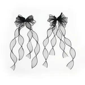 Black gothic lolita hair clips with angel wings and chains, perfect for Y2K style.