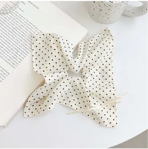 French style white polka dot square scarf hair tie with ribbon bow detail.