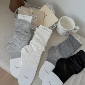 Thin ballet style slouch socks in various colors with a soft silk-like texture