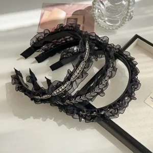 Luxury black ruffled headband with elegant leaf rhinestone accents for women