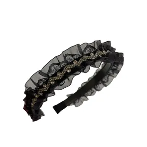 Elegant black ruffle lace headband with leaf-shaped rhinestone details for women.