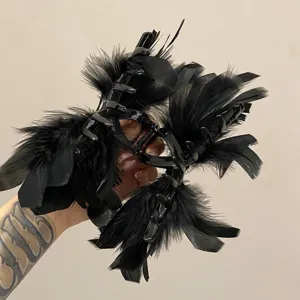 Close-up of elegant black ostrich feather hair claw clip for women's hair styling