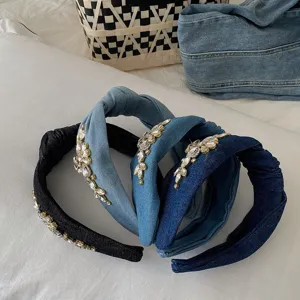 Luxury denim headbands with sparkling rhinestone accents and elegant knotted top detail.
