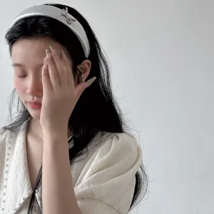 Silver bow PU leather headband for women with elegant high top design for hair styling