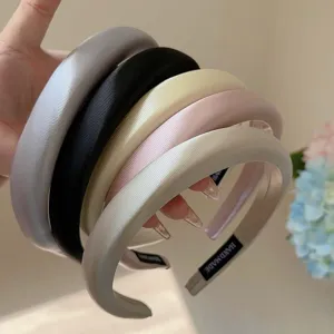 Elegante juego de diademas acolchadas de satén con diseño alto para peinados de mujer.