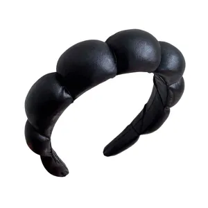 Serre-tête rembourré noir style nuage avec design éponge à bulles pour du volume