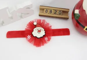 Vista detallada de la pulsera navideña roja de Papá Noel con gorro de purpurina y base de tul