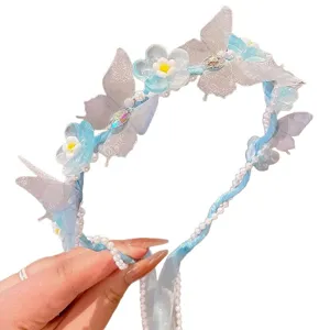 Enchanting blue floral headband for girls featuring butterflies and elegant long ribbons.