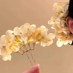 Elegant pink petal floral hair pin for traditional Chinese style and Hanfu hairstyles