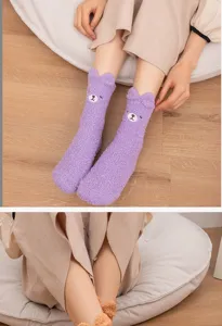 Close-up of cozy purple fuzzy socks featuring 3D bear ears and cute animal face detail