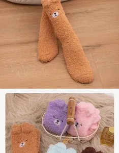 Detailed view of soft cartoon coral fleece floor socks with cute 3D ears in various colors