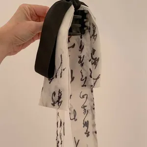 Pince à cheveux de style chinois avec nœud en ruban aux motifs de peinture à l'encre