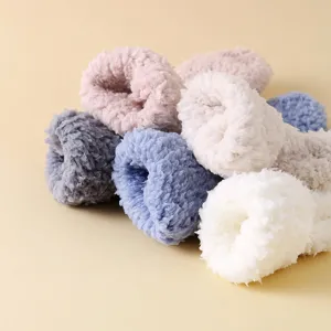 Weiche Korallenvlies-Socken verdickt Winter Bodensocken in Pastellfarben Damen.