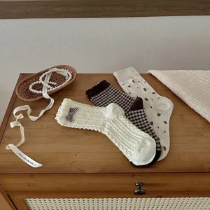 Set of three Japanese-style autumn women's socks featuring bow and vintage floral patterns