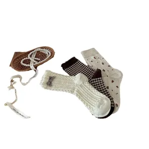 Japanese style women's socks set featuring bow, floral print, and checkered patterns