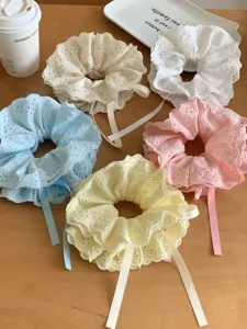 Collection of five colorful four-layer lace scrunchies featuring adjustable drawstring ribbons