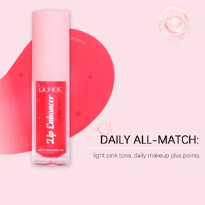 Huile à lèvres hydratante OUHOE texture légère, teinte rose clair pour le maquillage quotidien.