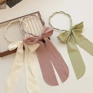 Diademas elegantes con perlas y lazos de satén en varios colores
