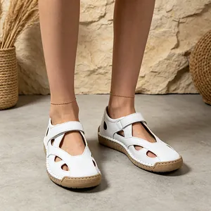 White leather hollow-out flat nurse shoes with adjustable strap for women