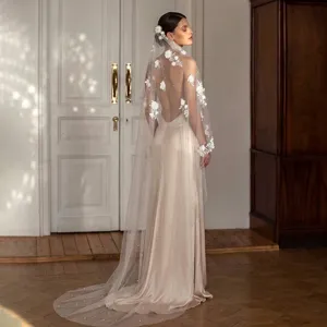 Detail view of a 3-meter cathedral length bridal veil with 3D floral appliques and pearls