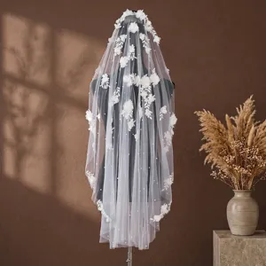 Elegant white bridal veil with 3D floral appliqués and exquisite lace embroidery details