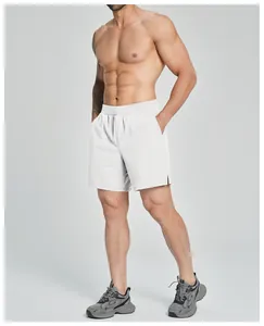 Professional side view of men's white quick-dry sports fitness shorts on model
