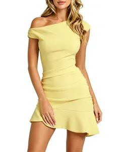 Detail of a yellow one-shoulder ruched bodycon dress with an asymmetrical ruffled hem