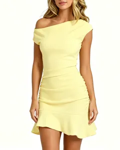 Detailed view of yellow one-shoulder ruched mini dress with an asymmetrical ruffle hemline