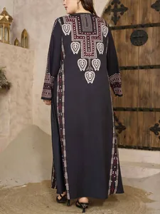 Detailed back view of a navy blue long-sleeved abaya with intricate ethnic embroidery.