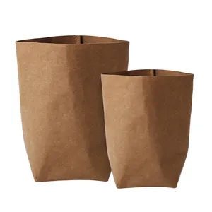 Two versatile washable kraft paper bags for eco-friendly home storage and plant covers