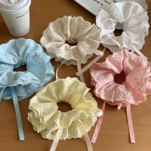Set of five four-layer lace scrunchies with adjustable ribbons in pastel colors