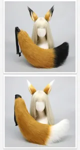 Detailed view of large handmade faux fur fox ears and fluffy tail cosplay costume props.
