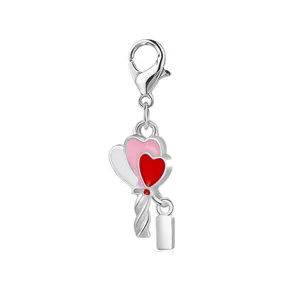 Detailed macro view of silver lobster clasp charm with three colorful enamel hearts